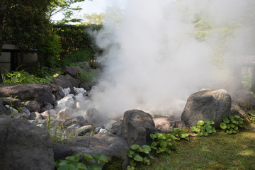 stone or rock with hell hot springs located at active volcano mountain.
