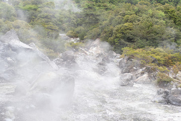 stone or rock with hell hot springs located at active volcano mountain.