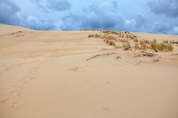 clouds over the sandy dune 