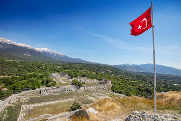 Naklejka premium Tlos is an ancient ruined Lycian hilltop citadel near the resort town of Fethiye in the Mugla Province of southern Turkey