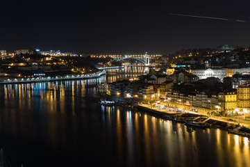 Panoramic view of the city of Porto and Vila Nova de Gaia at night with the river Douro between the two cities, Porto, northern Portugal