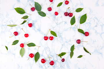 Fresh red cherries on the marble table.