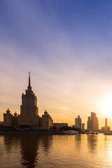 Obraz premium Cityscape and Landscape of downtown Moscow with Modern skyscrapers, office building and Moskva river over Sunrise sky, Moscow City, Russia