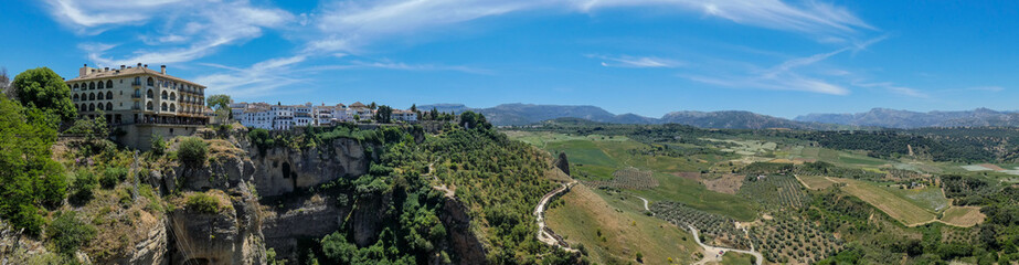 Fototapeta na wymiar Panoramic view from terrace of city Ronda to surrounding landscape, Andalusia, Spain