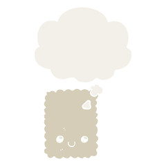 cartoon biscuit and thought bubble in retro style