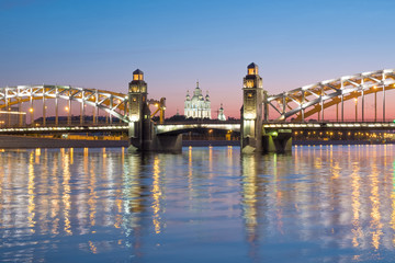 Fototapeta premium View of the Smolny Cathedral and the Bolsheokhtinsky bridge during the White Nights in June. St. Petersburg. Russia