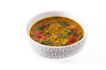 Indian lentil soup dal (dhal) in a bowl isolated on white background