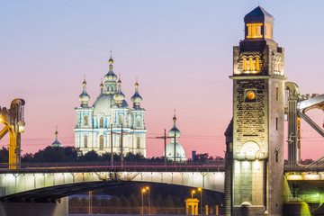 Fototapeta premium View of the Smolny Cathedral and the Bolsheokhtinsky bridge during the White Nights in June. St. Petersburg. Russia