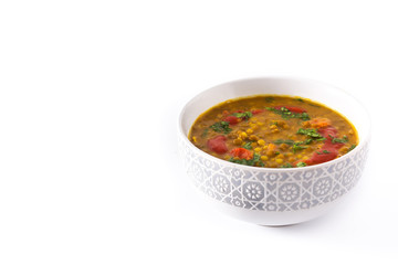 Indian lentil soup dal (dhal) in a bowl isolated on white background. Copyspace