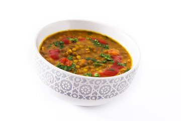 Indian lentil soup dal (dhal) in a bowl isolated on white background