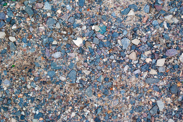 stones scattered on the road. pebbles. background