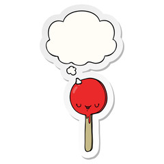 cartoon candy lollipop and thought bubble as a printed sticker