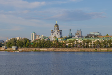 Yekaterinburg. Summer city landscape. View of the River Iset and the Church of the Resplendent in the Russian Land.