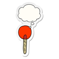 cartoon candy lollipop and thought bubble as a printed sticker
