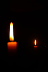 Candle with its reflection
