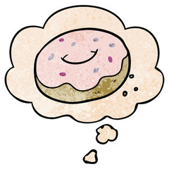 cartoon donut and thought bubble in grunge texture pattern style