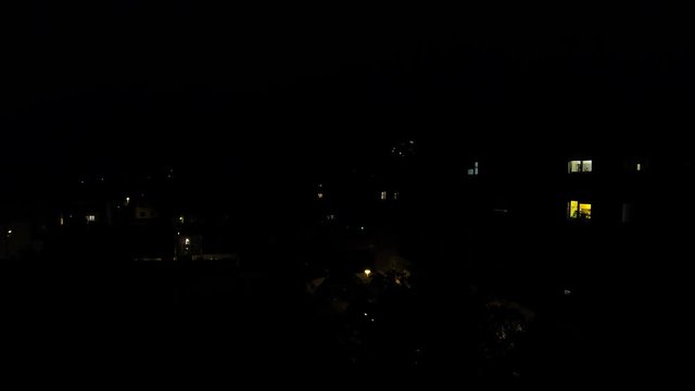 View Of Apartment Building Lights At Night Time Lapse