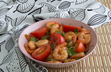 Salad with Royal prawns, red tomatoes, dill, parsley and green onions