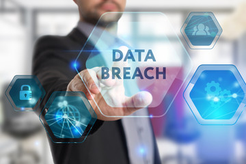 The concept of business, technology, the Internet and the network. A young entrepreneur working on a virtual screen of the future and sees the inscription: Data breach