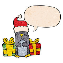 cute christmas penguin and speech bubble in retro texture style