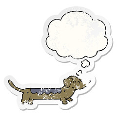 cartoon dog and thought bubble as a distressed worn sticker