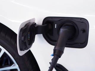 Electric power cars are filling electricity.