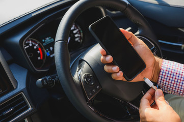 Charging smart phones in the car