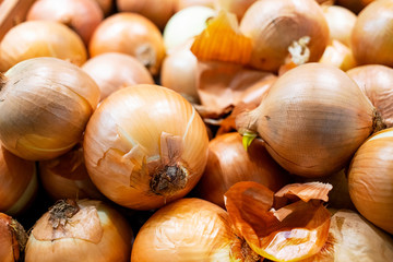 Full frame of fresh onions for sell at the market