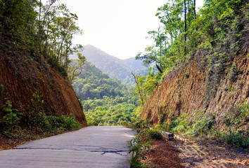 Old concrete road that passes through the gorge, the rural route of Asia.