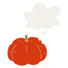 cartoon pumpkin and thought bubble in retro style
