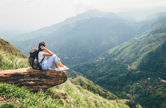 Tourist woman enjoy with beautiful view on mountains in Ella, Sri Lanka, Little Adam Peak