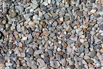 Surface of colorful pebble as background 