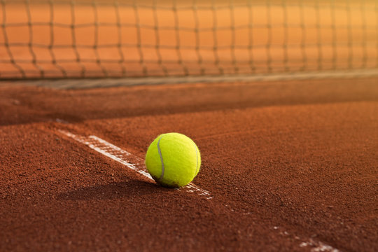 Tennis game. Tennis ball on the tennis court. Sport, recreation concept