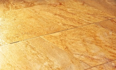 floor of marble tiles, squares, warm shade of stone, close-up