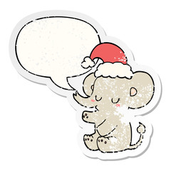 cute christmas elephant and speech bubble distressed sticker