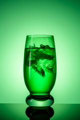 Beautiful glass Cup with lemonade and ice close up vertical view