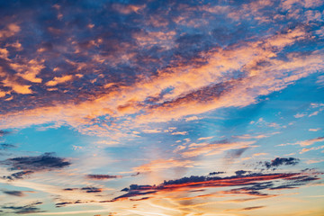 Amazing cloudscape on the sky at sunset time after rain.