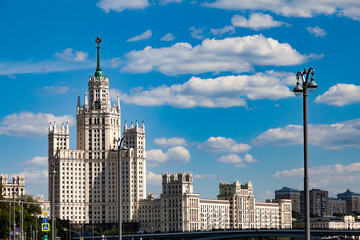 Fototapeta na wymiar Stalin skyscraper on the embankment of the Moscow River