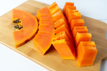 slice of tasty papaya with seeds