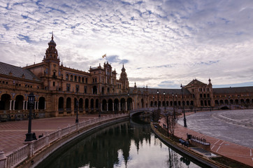 Fototapeta na wymiar Tourism in the city of Seville, Plaza de España, Triana neighborhood, Rio Guadalquivir ...