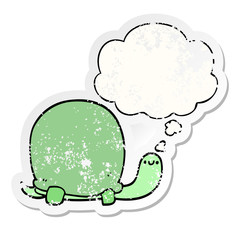cute cartoon tortoise and thought bubble as a distressed worn sticker