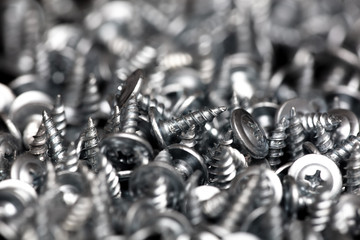 Sharp screws as abstract background