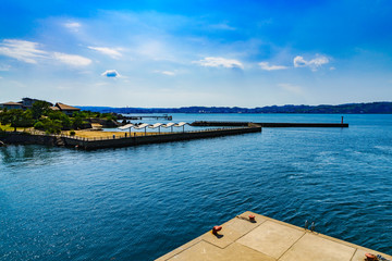 Obraz premium [桜島のイメージ][交通イメージ] 桜島フェリーが発着する桜島港