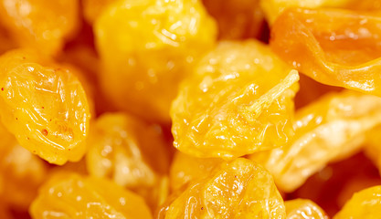 Yellow raisins as background