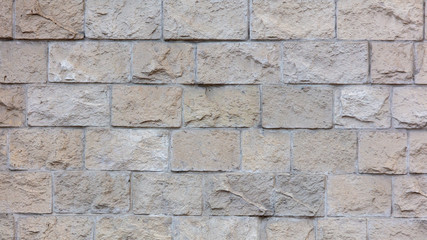 Decorative bricks on the wall of the house as a background