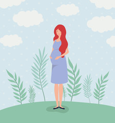 cute woman pregnancy in the landscape