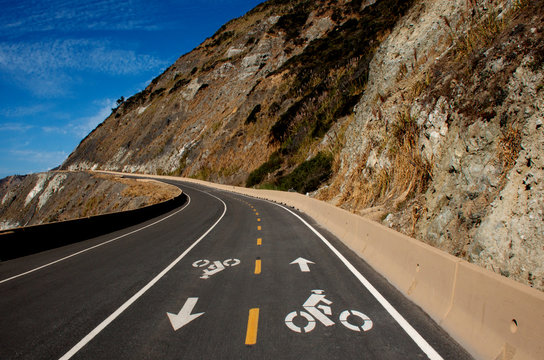 Bike lanes with direction arrows and Hiking Trail are kept separate for safety along the California Coastal Trail at Devil&rsquo;s Slide, San Mateo County, California 