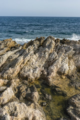 Fototapeta na wymiar Mediterranean sea crashing against the rocks of the Spanish island of Mallorca, Ibiza, Spain.