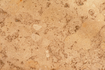 Golden marble texture of a natural white and golden stone tile.