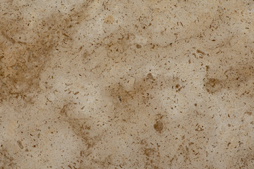 Golden marble texture of a natural white and golden stone tile.